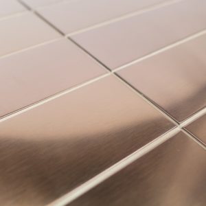 A beautiful rectanagular copper wall tile