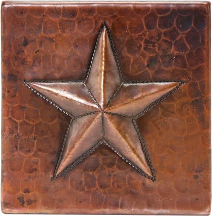 A metal tile made from copper with a lifter star symbol