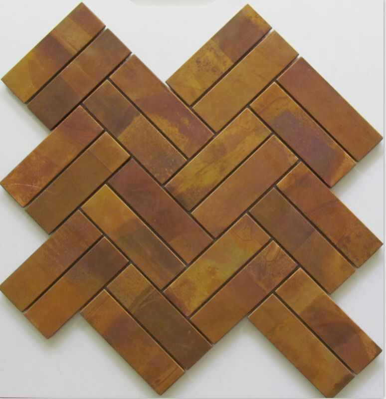 This metal herringbone tile is great for kitchen and bathroom splashbacks. The tile is made from copper.