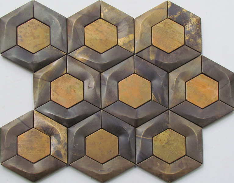 A beautiful hexagonal wall tile. This is a metal mosaic tile made from copper.