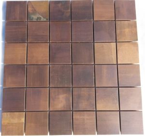 Copper mosaic wall tile perfect for kitchen and bathroom splashbacks. The tile is made from copper.