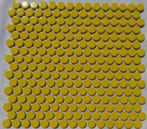 A yellow coloured round, penny mosaic porcelain tile.