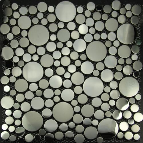 The highly polished stainless steel tile is round in shape and used as kitchen or bathroom splashback.