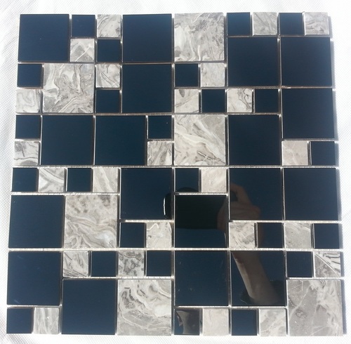 A marble and stainless steel mosac splashback tile.