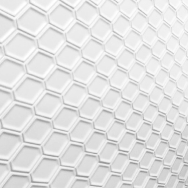 A wall tile in Matte white colour. A beautiful Porcelain Honeycomb Mosaic Tiles.