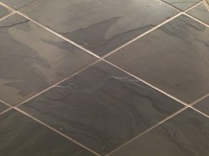 Charcoal coloured clate floor and wall tile