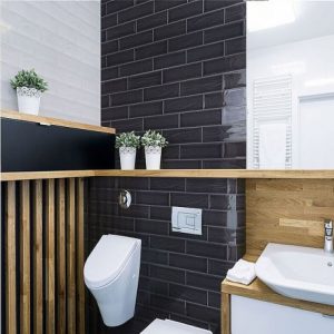 A dark Spanish subway tile the Black Gloss Aria is a wall tile used in bathrooms and kitchens.