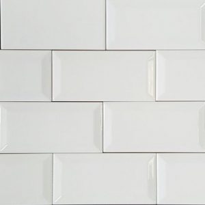 A white gloss bevelled subway ceramic tile. The perfect splashback tile for kitchen or bathroom