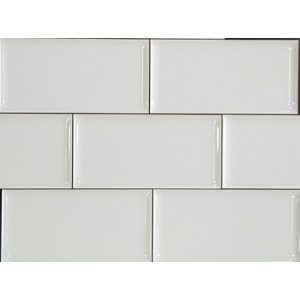 A whiye gloss semi rounded ceramic subway wall tile. Great for use in kitchen and bathroom splashbacks