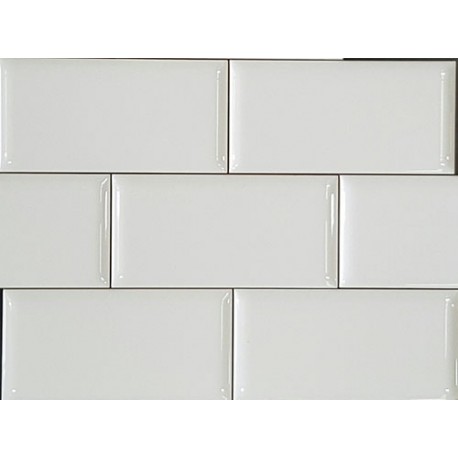 A whiye gloss semi rounded ceramic subway wall tile. Great for use in kitchen and bathroom splashbacks