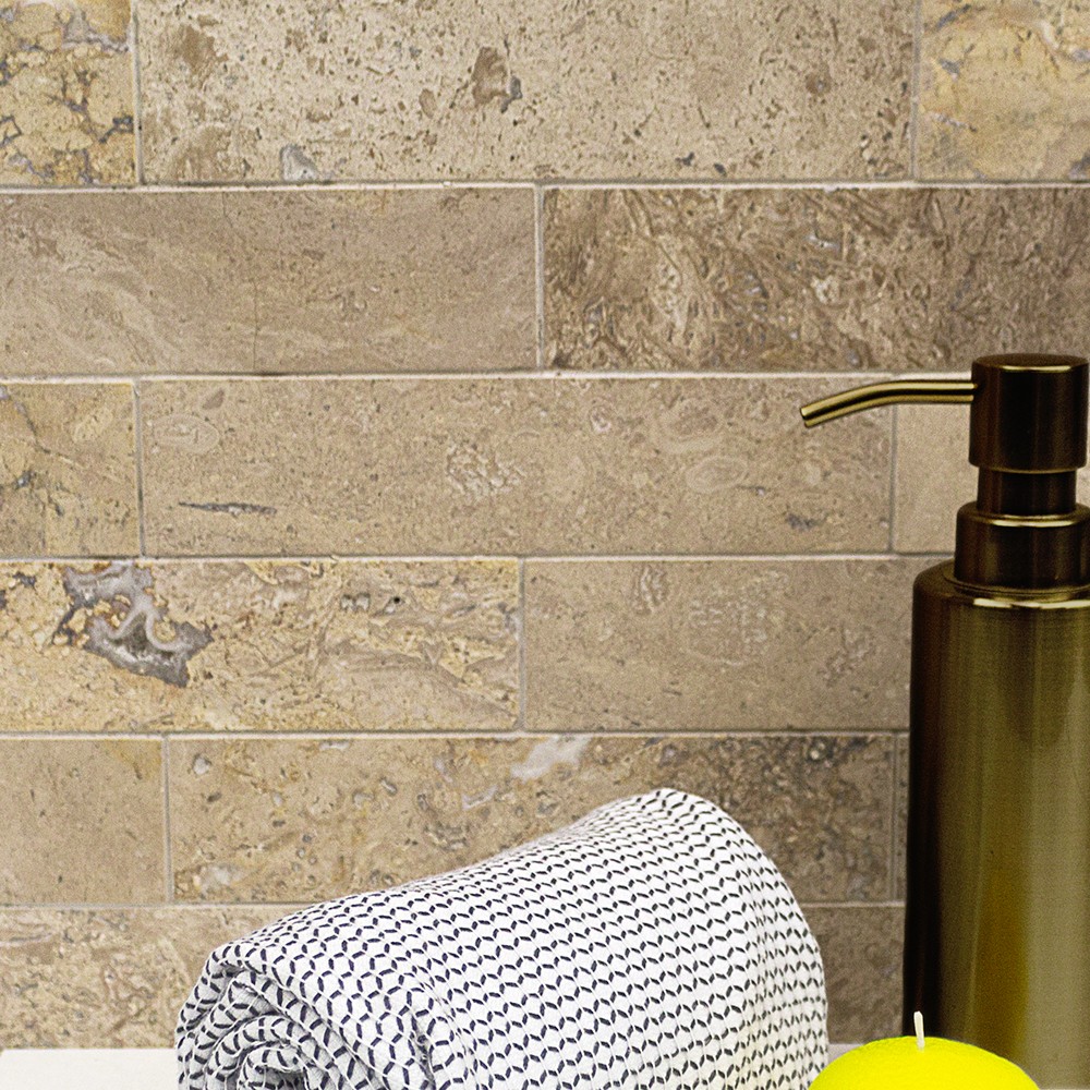 A travertine subway tile in brushed stone. Great for bathroom and wall tiles.