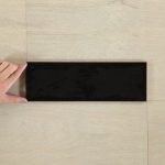 A black ceramic subway tile. The perfect tile for use in kitchen and bathroom splashbacks