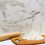 A marble tile. The Calacatta Gold is a subway tile best used as a wall tile in bathrooms and kitchens.