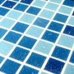 A great splashback and pool tile combining light blue colours