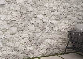 Light natural stone cladding tile applied to wall